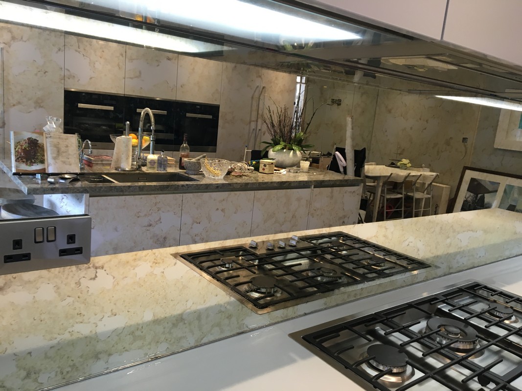 Mirror glass splashback in Greenford luxury kitchen